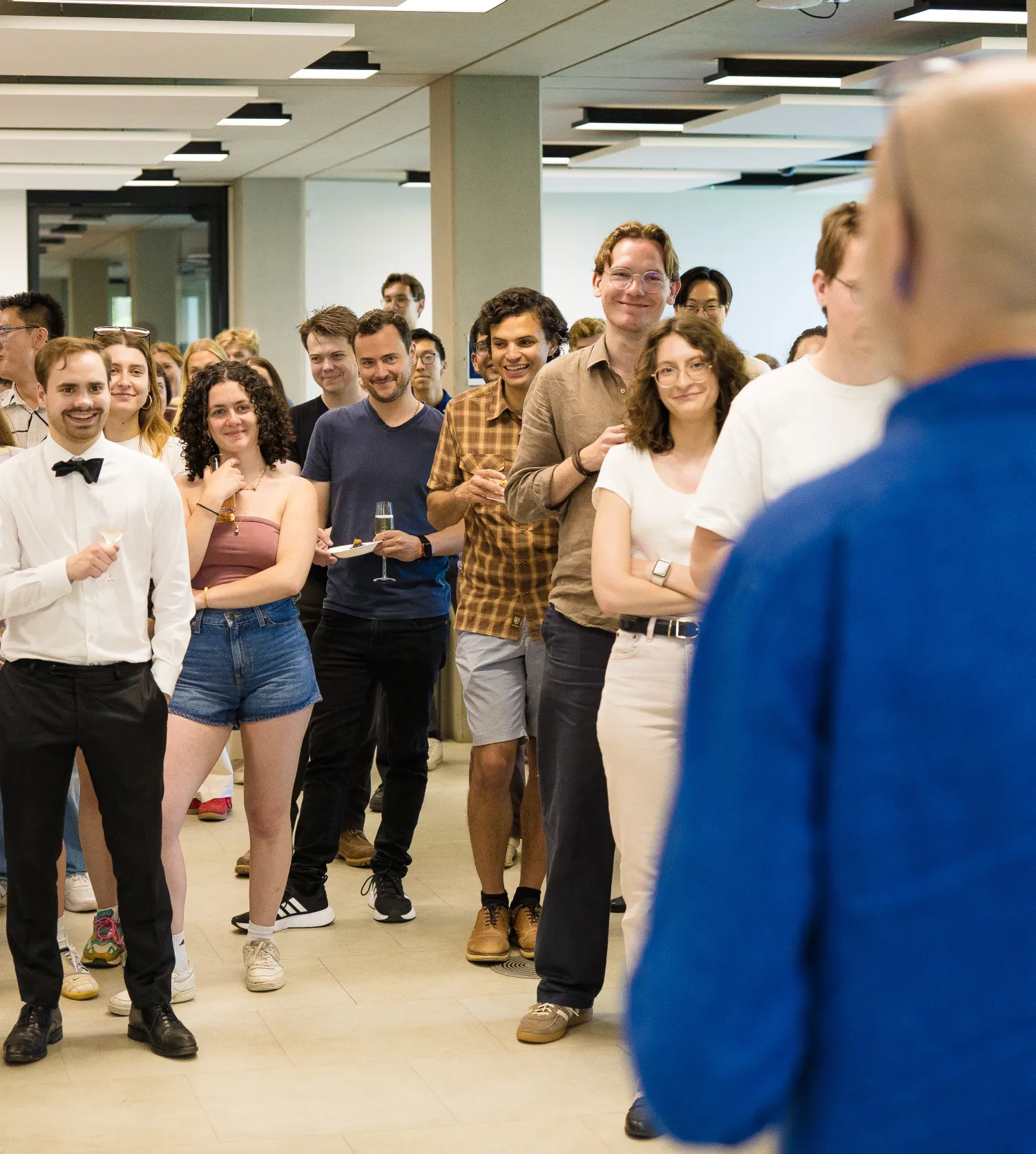 image of a man standing in front of a group of students