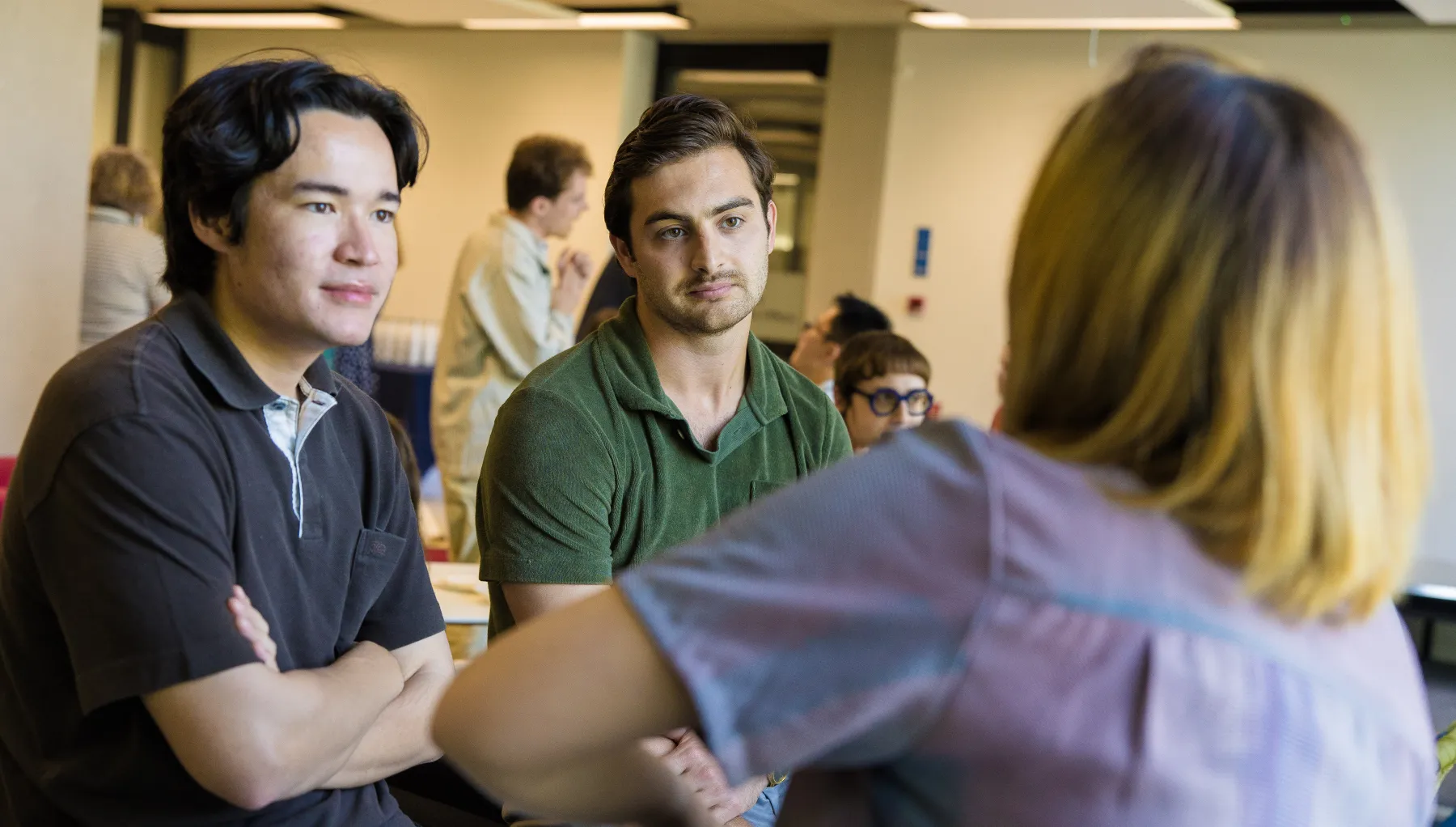 image of three students talking
